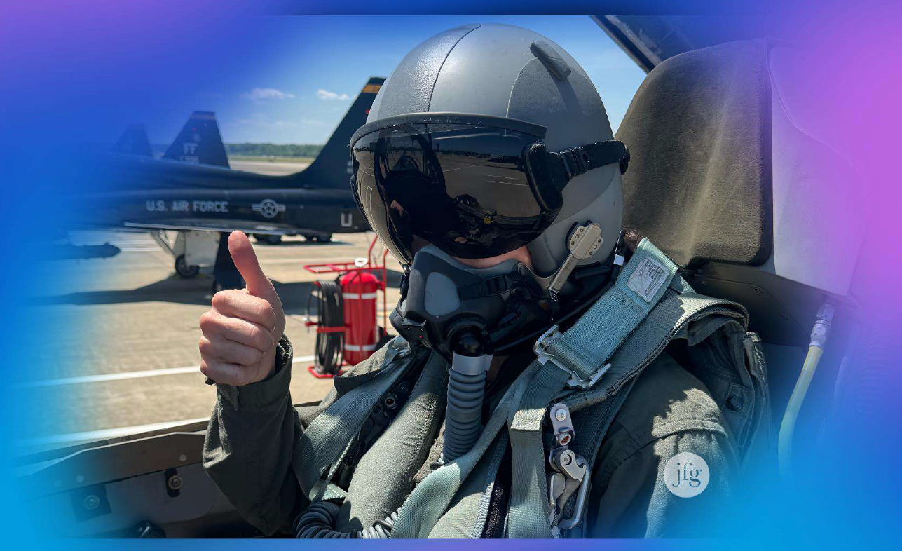 Funt in flight gear giving a thumbs up while seated in a jet cockpit, proprietary JFG image.