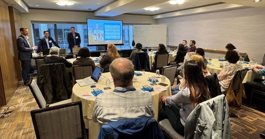 Seattle Panel discussion with three speakers presenting to attendees at a Rego Consulting Clarity user group session.