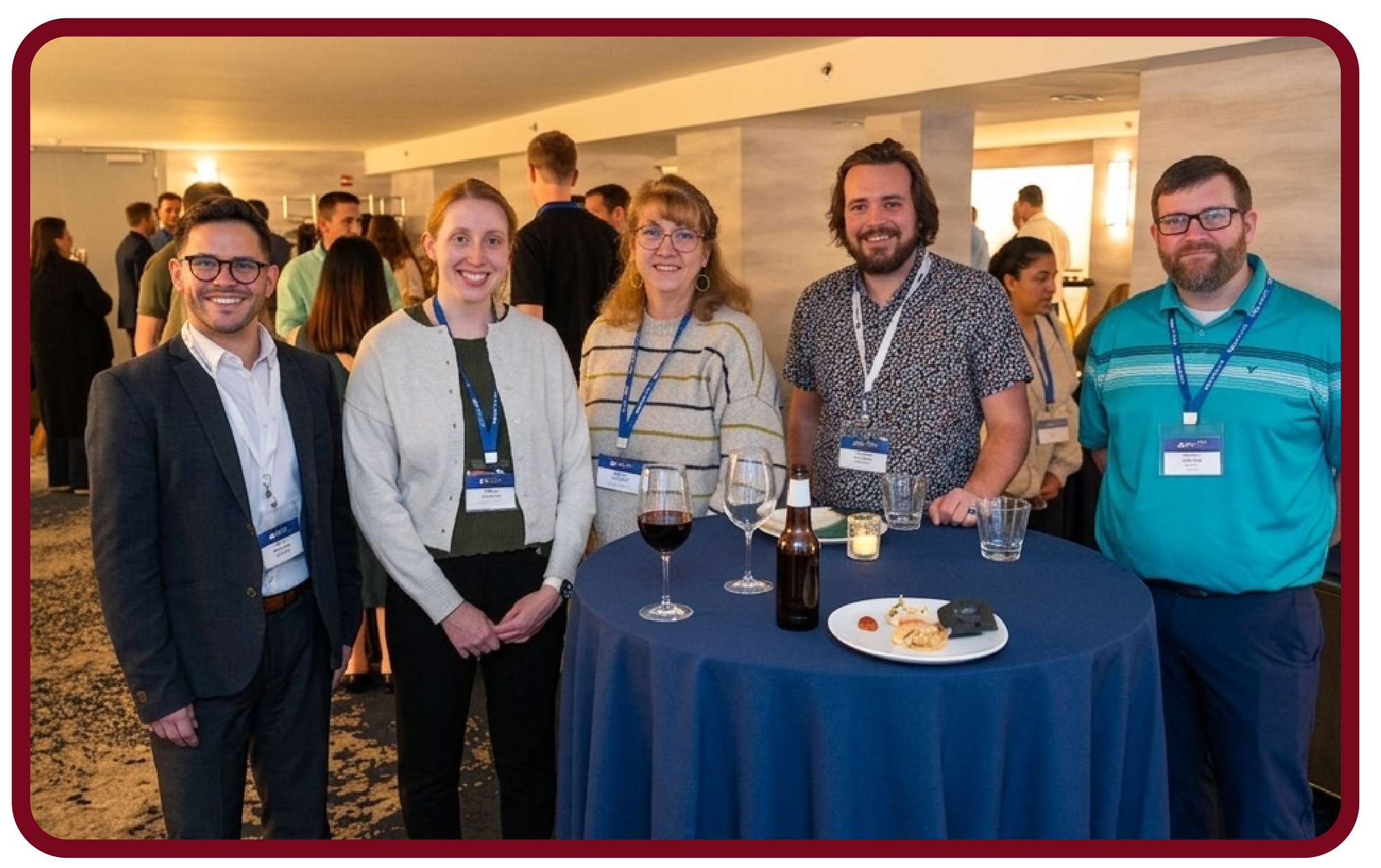 Attendees connect during a Rego University networking reception before conference sessions and activities.